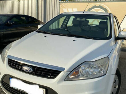 Белый Форд Фокус, объемом двигателя 1.4 л и пробегом 234 тыс. км за 6300 $, фото 1 на Automoto.ua