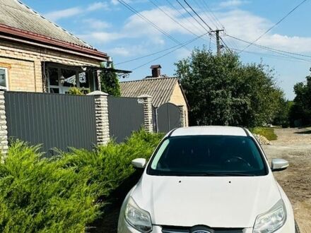 Білий Форд Фокус, об'ємом двигуна 2 л та пробігом 182 тис. км за 7000 $, фото 1 на Automoto.ua