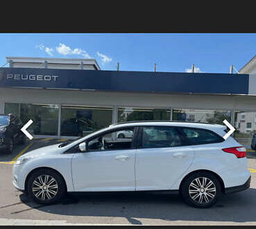 Білий Форд Фокус, об'ємом двигуна 1.56 л та пробігом 210 тис. км за 7900 $, фото 1 на Automoto.ua