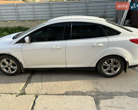 Белый Форд Фокус, объемом двигателя 1.6 л и пробегом 244 тыс. км за 7100 $, фото 1 на Automoto.ua