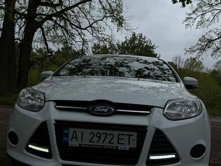 Белый Форд Фокус, объемом двигателя 1 л и пробегом 160 тыс. км за 6500 $, фото 1 на Automoto.ua