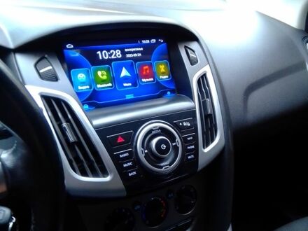 Белый Форд Фокус, объемом двигателя 1 л и пробегом 120 тыс. км за 6300 $, фото 1 на Automoto.ua