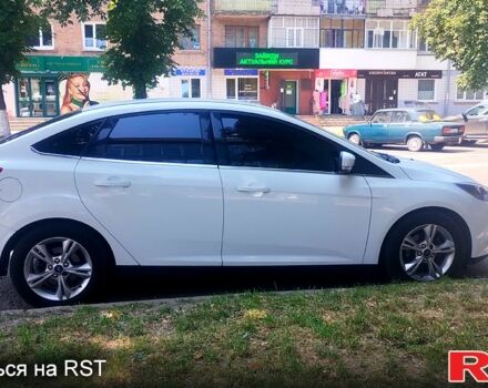 Белый Форд Фокус, объемом двигателя 1 л и пробегом 137 тыс. км за 6000 $, фото 1 на Automoto.ua