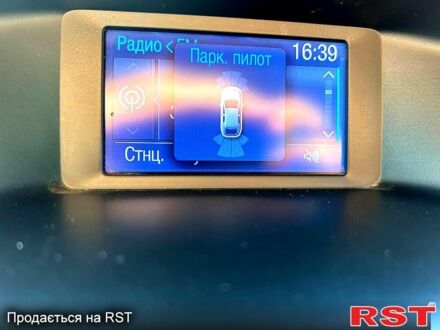 Белый Форд Фокус, объемом двигателя 1 л и пробегом 164 тыс. км за 7600 $, фото 1 на Automoto.ua