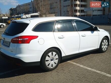 Белый Форд Фокус, объемом двигателя 1 л и пробегом 211 тыс. км за 5700 $, фото 1 на Automoto.ua