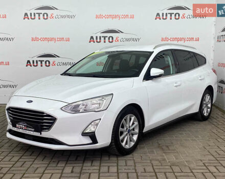 Білий Форд Фокус, об'ємом двигуна 2 л та пробігом 180 тис. км за 14250 $, фото 1 на Automoto.ua