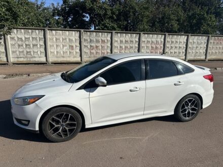 Білий Форд Фокус, об'ємом двигуна 2 л та пробігом 165 тис. км за 7025 $, фото 1 на Automoto.ua