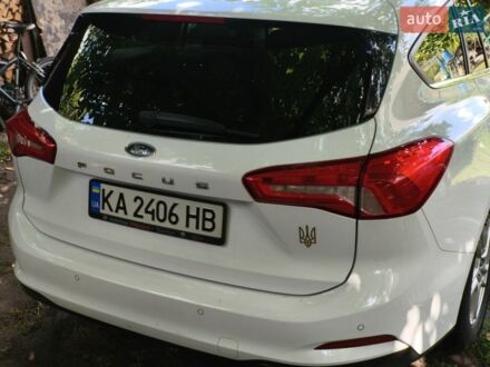 Білий Форд Фокус, об'ємом двигуна 2 л та пробігом 206 тис. км за 12000 $, фото 1 на Automoto.ua