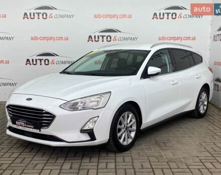 Белый Форд Фокус, объемом двигателя 2 л и пробегом 180 тыс. км за 14250 $, фото 1 на Automoto.ua