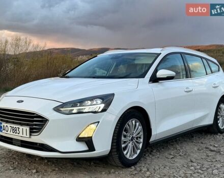 Белый Форд Фокус, объемом двигателя 2 л и пробегом 245 тыс. км за 13700 $, фото 1 на Automoto.ua