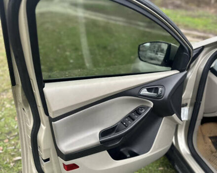 Бежевый Форд Фокус, объемом двигателя 2 л и пробегом 115 тыс. км за 7299 $, фото 17 на Automoto.ua