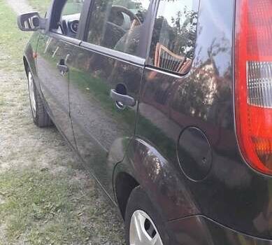 Чорний Форд Фокус, об'ємом двигуна 1.4 л та пробігом 125 тис. км за 3500 $, фото 7 на Automoto.ua