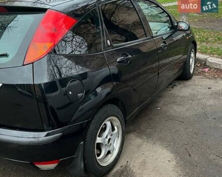 Черный Форд Фокус, объемом двигателя 1.8 л и пробегом 306 тыс. км за 4500 $, фото 5 на Automoto.ua