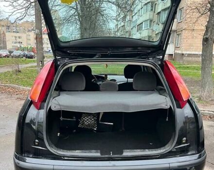 Черный Форд Фокус, объемом двигателя 1.8 л и пробегом 306 тыс. км за 4500 $, фото 13 на Automoto.ua