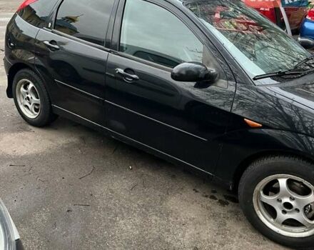 Черный Форд Фокус, объемом двигателя 1.8 л и пробегом 306 тыс. км за 4500 $, фото 4 на Automoto.ua