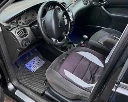 Черный Форд Фокус, объемом двигателя 1.8 л и пробегом 306 тыс. км за 4500 $, фото 7 на Automoto.ua