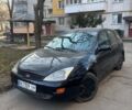 Черный Форд Фокус, объемом двигателя 1.6 л и пробегом 257 тыс. км за 2400 $, фото 1 на Automoto.ua