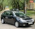 Черный Форд Фокус, объемом двигателя 1.8 л и пробегом 143 тыс. км за 2850 $, фото 1 на Automoto.ua