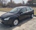 Чорний Форд Фокус, об'ємом двигуна 1.8 л та пробігом 229 тис. км за 4800 $, фото 1 на Automoto.ua