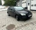 Черный Форд Фокус, объемом двигателя 1.8 л и пробегом 265 тыс. км за 3700 $, фото 2 на Automoto.ua