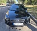 Черный Форд Фокус, объемом двигателя 1.6 л и пробегом 240 тыс. км за 5783 $, фото 1 на Automoto.ua