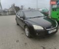Черный Форд Фокус, объемом двигателя 2 л и пробегом 300 тыс. км за 4300 $, фото 1 на Automoto.ua