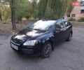 Черный Форд Фокус, объемом двигателя 1.6 л и пробегом 146 тыс. км за 5200 $, фото 1 на Automoto.ua