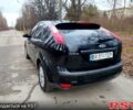 Черный Форд Фокус, объемом двигателя 1.8 л и пробегом 260 тыс. км за 3900 $, фото 6 на Automoto.ua