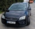 Черный Форд Фокус, объемом двигателя 1.6 л и пробегом 242 тыс. км за 5100 $, фото 1 на Automoto.ua