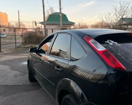 Чорний Форд Фокус, об'ємом двигуна 2 л та пробігом 313 тис. км за 3250 $, фото 4 на Automoto.ua