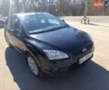 Черный Форд Фокус, объемом двигателя 1.6 л и пробегом 170 тыс. км за 4600 $, фото 1 на Automoto.ua