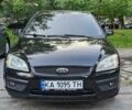Черный Форд Фокус, объемом двигателя 1.6 л и пробегом 300 тыс. км за 4200 $, фото 1 на Automoto.ua