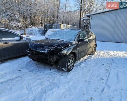 Черный Форд Фокус, объемом двигателя 1.6 л и пробегом 200 тыс. км за 2399 $, фото 1 на Automoto.ua