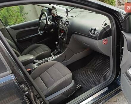 Черный Форд Фокус, объемом двигателя 1.8 л и пробегом 287 тыс. км за 6800 $, фото 17 на Automoto.ua