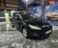 Черный Форд Фокус, объемом двигателя 1.6 л и пробегом 185 тыс. км за 4900 $, фото 1 на Automoto.ua