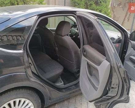 Черный Форд Фокус, объемом двигателя 1.8 л и пробегом 287 тыс. км за 6800 $, фото 15 на Automoto.ua