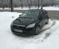 Черный Форд Фокус, объемом двигателя 1.6 л и пробегом 250 тыс. км за 5000 $, фото 1 на Automoto.ua