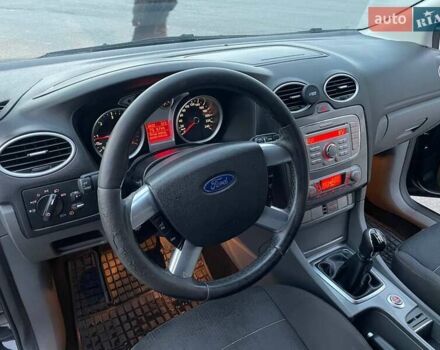 Черный Форд Фокус, объемом двигателя 1.8 л и пробегом 245 тыс. км за 7000 $, фото 46 на Automoto.ua