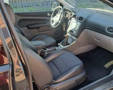 Черный Форд Фокус, объемом двигателя 2 л и пробегом 150 тыс. км за 4550 $, фото 12 на Automoto.ua