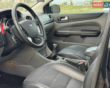 Черный Форд Фокус, объемом двигателя 1.8 л и пробегом 193 тыс. км за 5749 $, фото 44 на Automoto.ua