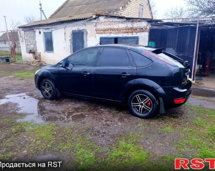 Черный Форд Фокус, объемом двигателя 1.6 л и пробегом 300 тыс. км за 4600 $, фото 2 на Automoto.ua