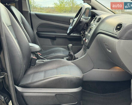 Черный Форд Фокус, объемом двигателя 1.8 л и пробегом 193 тыс. км за 5999 $, фото 84 на Automoto.ua