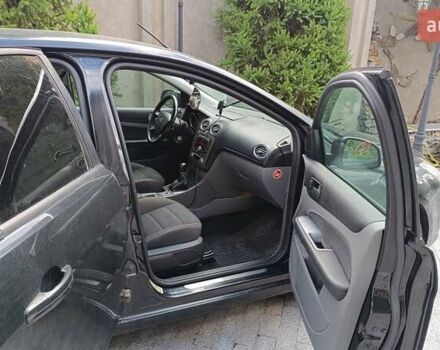 Черный Форд Фокус, объемом двигателя 1.8 л и пробегом 287 тыс. км за 6800 $, фото 16 на Automoto.ua