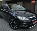 Черный Форд Фокус, объемом двигателя 1.6 л и пробегом 209 тыс. км за 6850 $, фото 2 на Automoto.ua