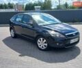 Черный Форд Фокус, объемом двигателя 1.56 л и пробегом 405 тыс. км за 4950 $, фото 1 на Automoto.ua