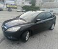Черный Форд Фокус, объемом двигателя 1.6 л и пробегом 305 тыс. км за 5500 $, фото 1 на Automoto.ua