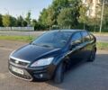 Черный Форд Фокус, объемом двигателя 1.39 л и пробегом 200 тыс. км за 4850 $, фото 1 на Automoto.ua