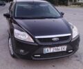 Черный Форд Фокус, объемом двигателя 1.4 л и пробегом 260 тыс. км за 3906 $, фото 1 на Automoto.ua