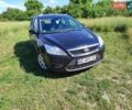 Черный Форд Фокус, объемом двигателя 1.39 л и пробегом 214 тыс. км за 5200 $, фото 1 на Automoto.ua