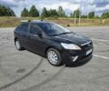 Черный Форд Фокус, объемом двигателя 1.6 л и пробегом 160 тыс. км за 4917 $, фото 1 на Automoto.ua